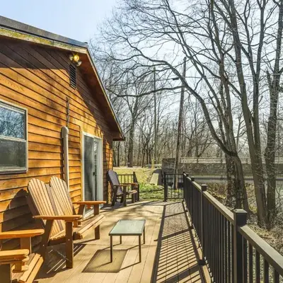 Riverfront Covington Cabin with Deck and Fire Pit!