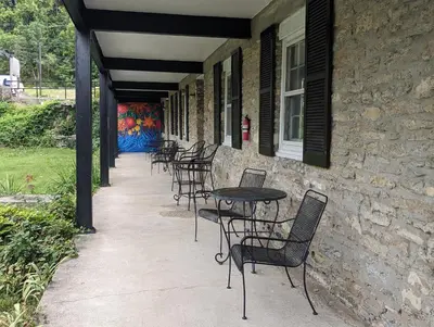 a row of tables and chairs on a patio at Riverboat Inn & Suites in Madison