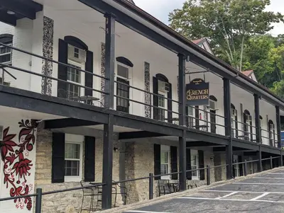 a building with a balcony on the side of it at Riverboat Inn & Suites in Madison