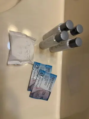 a nintendo wii game controller and a bill on a door at Clinton Inn & Suites in Port Clinton