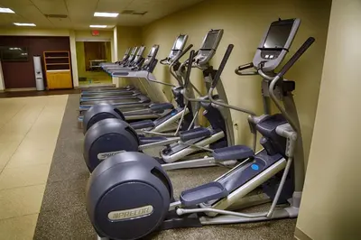 a row of exercise bikes in a gym at DoubleTree by Hilton Lawrenceburg in Lawrenceburg