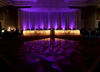 a room with purple lights and a dance floor at DoubleTree by Hilton Lawrenceburg in Lawrenceburg