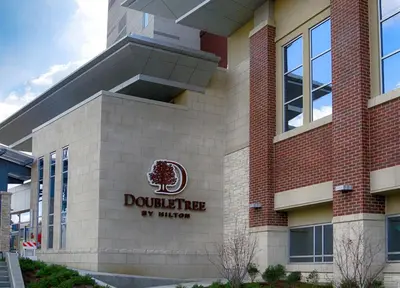 a building with the duluth hyler sign on it at DoubleTree by Hilton Lawrenceburg in Lawrenceburg