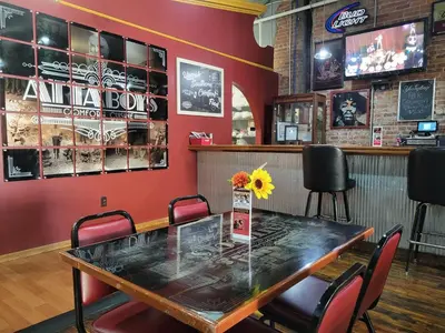 a dining room with a table and chairs at The Baker The Archive Lofts in Marion