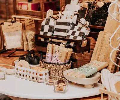 a table topped with lots of shoes and baskets at The Baker The Archive Lofts in Marion