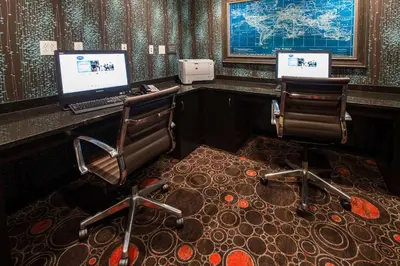 a room with two desks with two chairs and a computer at Hampton Inn & Suites Toledo/Westgate in Toledo