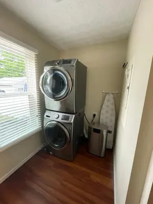 a washing machine sitting in a room next to a window at Home sweet home in Columbus