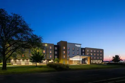 a rendering of a building at night with a street at Fairfield Inn & Suites by Marriott Columbus Airport in Columbus