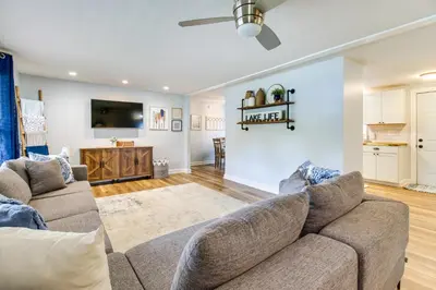 a living room with a couch and a tv at Hillsboro Hideaway with Private Hot Tub and Bunkhouse! in Hillsboro