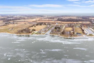 an aerial view of the water and a parking lot at Hot Tub, Lake Access, and Dock Port Clinton Retreat in Port Clinton