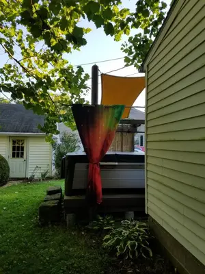 a back end of a truck with a red and green propellor at 1936 Art & International Home in Lancaster