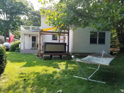 a yard with a grill and a house at 1936 Art & International Home in Lancaster