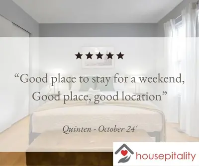 a bedroom with a bed with four stars on it at The Highmeadow Retreat in Gahanna