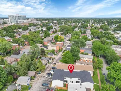 an aerial view of a residential neighborhood with a house with a red number at The Schumacher Place - NEW 2 BR in Columbus