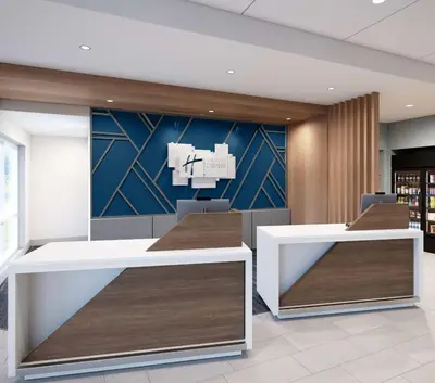 an office with two desks and a wall with a mural at Holiday Inn Express & Suites Columbus - New Albany by IHG in New Albany