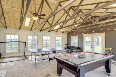a room with two ping pong tables in it at Dry Ridge Rental Home with Hot Tub and Game Room! in Dry Ridge