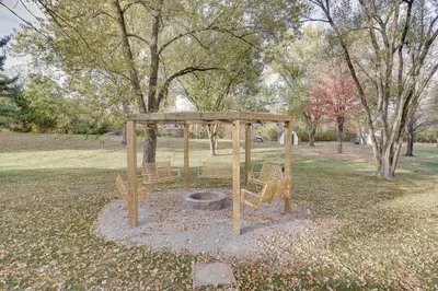 a park with a shelter and benches in the grass at Powell Home with Fire Pit - 5 Mi to Columbus Zoo! in Powell