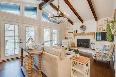 a living room with a couch and a fireplace at Powell Home with Fire Pit - 5 Mi to Columbus Zoo! in Powell
