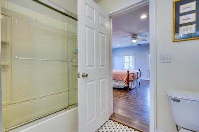 a bathroom with a shower and a toilet at Spacious and Inviting Jackson Getaway with Fireplace! in Jackson