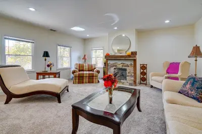 a living room filled with furniture and a fireplace at Spacious and Inviting Jackson Getaway with Fireplace! in Jackson