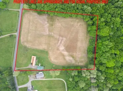 an aerial view of a field with a red rectangle at GameRoom, HotTub, Piano, 5mi to OldManCave - Hocking Hills Copper House in Laurelville