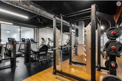 a gym with several treadmills and machines at Downtown Stroll to the Bengals in Cincinnati