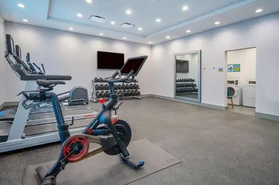 a gym with a treadmill and a exercise bike at Home2 Suites By Hilton West Chester Cincinnati in West Chester
