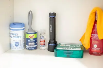 a shelf with a toothbrush and other items on it at King & Queen First Floor Unit! 1-2c Georgetown Villas in Fairview Park