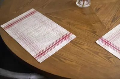 a wooden table with two napkins on top of it at King & Queen First Floor Unit! 1-2c Georgetown Villas in Fairview Park