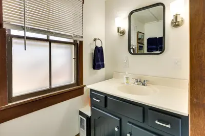 a bathroom with a sink and a mirror at Chagrin Falls Home about 2 Mi to Town! in Chagrin Falls