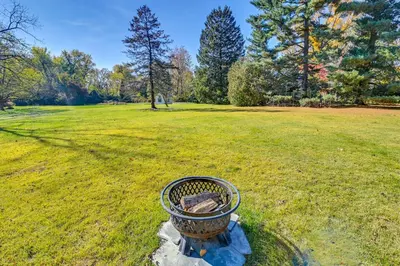a basket in the middle of a grass field at Near Downtown Cincinnati Peaceful Retreat! in Blue Ash