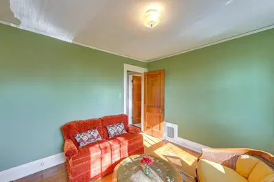 a living room with a couch and a table at Near Downtown Cincinnati Peaceful Retreat! in Blue Ash