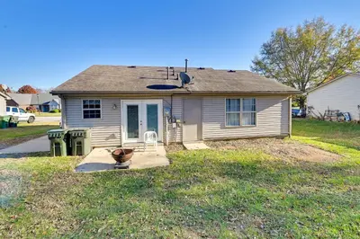 a small house with a porch and a yard at Georgetown Home about 6 Mi to Kentucky Horse Park! in Georgetown