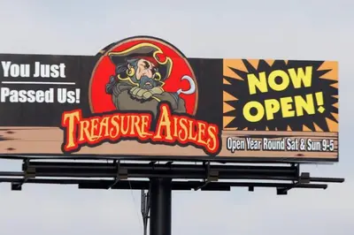 a sign for a restaurant with a monkey on it at Beautiful NEW Home among the Nook in Hamilton, OH in Hamilton