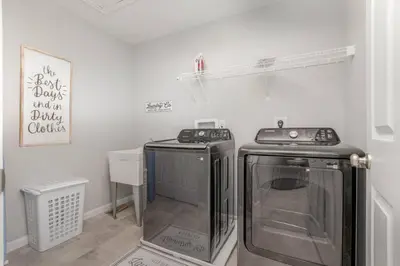 a kitchen with a stove and a dishwasher at Cul de sac home in Family friendly community in Maineville