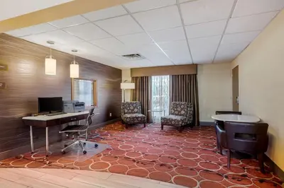 an office with a desk and chairs and a computer at Best Western Falcon Plaza - Bowling Green in Bowling Green
