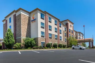 an image of a hotel with a car parked in front at Comfort Suites Bridgeport - Clarksburg in Bridgeport