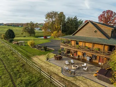 an overhead view of a farm house with a patio at The Lodge at Fields of Home in Millersburg
