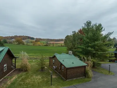 an overhead view of a house with a green roof at Olive Leaf Cabin in Millersburg