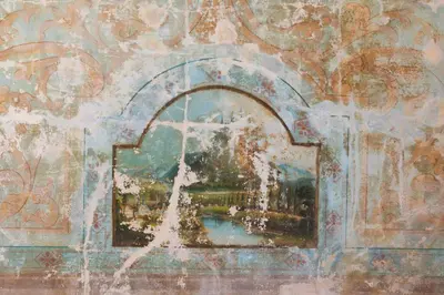 a painting of a cross on a wall at Parlor - Explore OTR and DT from Restored 1894 Italianate in Cincinnati