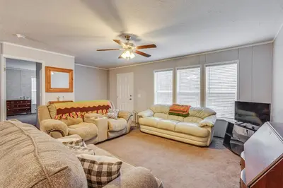 a living room with two couches and a ceiling fan at Pet-Friendly Home about 10 Mi to Hocking Hills! in South Bloomingville