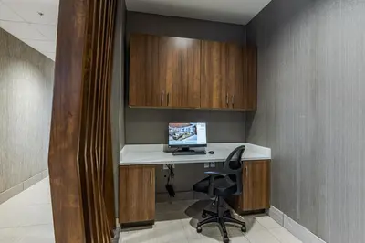 a office with a desk with a computer on it at SpringHill Suites by Marriott Fort Wayne Southwest in Fort Wayne