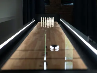 a close up of a bowling alley at Lakefront Loft - Downtown - Shuffle Board Table in Cleveland