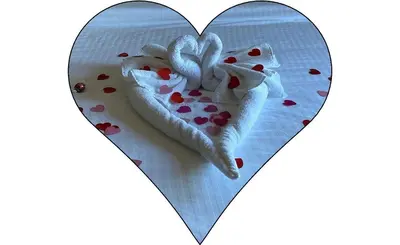 a heart shaped plate with hearts on it at Ashley Quarters Hotel Airport-Cincinnati in Florence