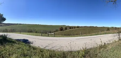 a dirt road in the middle of a field at 100 Acre Relaxing Retreat Near ARK - The Cottage in Williamstown