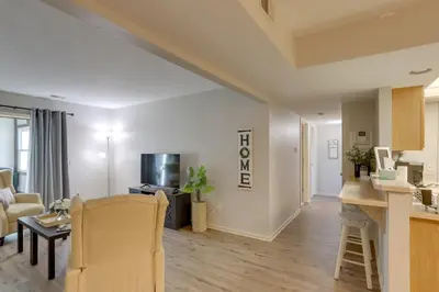 a living room with a couch and a table at Toledo Vacation Rental about 8 Mi to Downtown! in Toledo