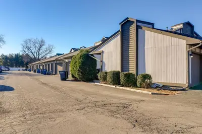 a row of houses on the side of a street at Toledo Vacation Rental about 8 Mi to Downtown! in Toledo