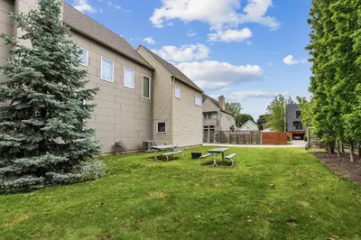 a yard with a picnic table and a house at Luxuary Tremont Home - Movie Room, Pet & Baby Friendly in Cleveland