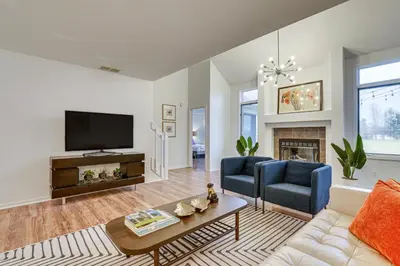 a living room with a couch and a tv at Tranquil Fort Wayne Home 7 Mi to Downtown in Fort Wayne