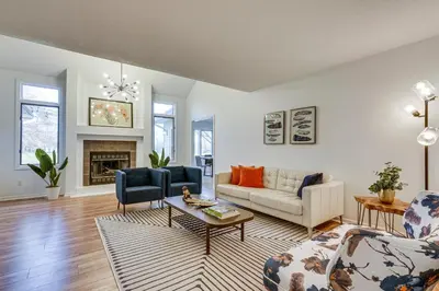 a living room with a couch and a table at Tranquil Fort Wayne Home 7 Mi to Downtown in Fort Wayne